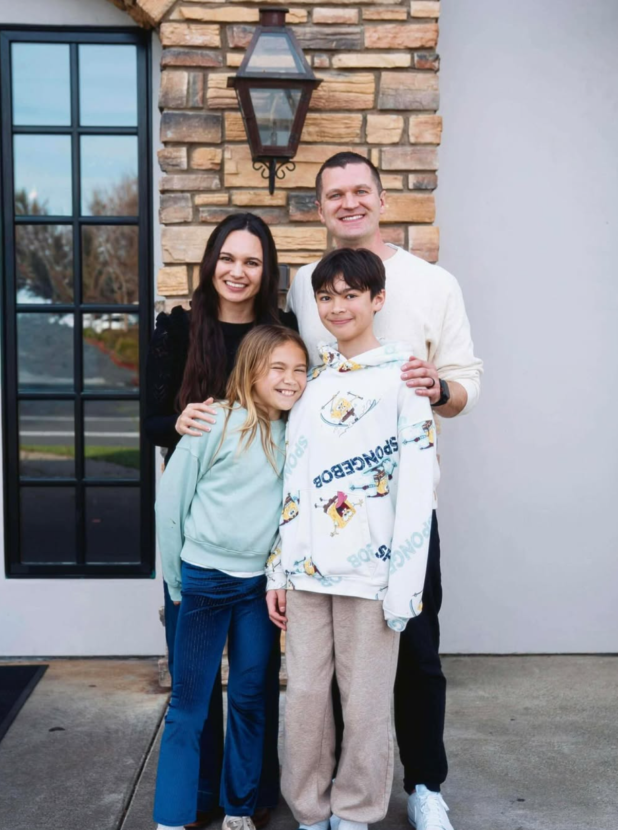 The Volk family — Jony, Maria, and their two kids